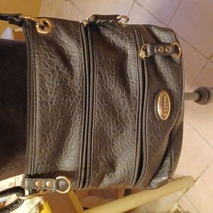 Black cross body multi zipper shoulder bag